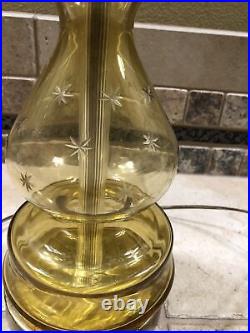 Antique lamp Amber color glass withstar decor and brass fittings 30 tall 22 base