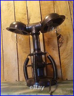 Handmade table lamp unique steampunk industrial look made of vintage auto parts