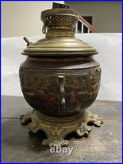 Rare Cast metal vintage oriental lamp with dragons and annimals as relief parts