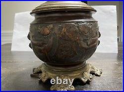 Rare Cast metal vintage oriental lamp with dragons and annimals as relief parts