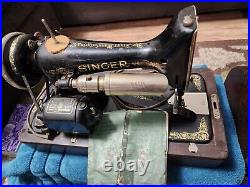 Singer 99 Sewing Machine with instructions, parts, knee control, lamp