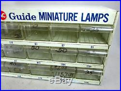 Vintage AC Guide, GM AC-Delco miniature lamps, light bulb shop parts cabinet