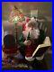 Vintage_Animated_Santa_On_Chair_With_Antique_Radio_And_Tiffany_Lamp_Motionette_01_clqe